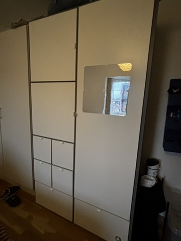 White cupboard with drawers - front